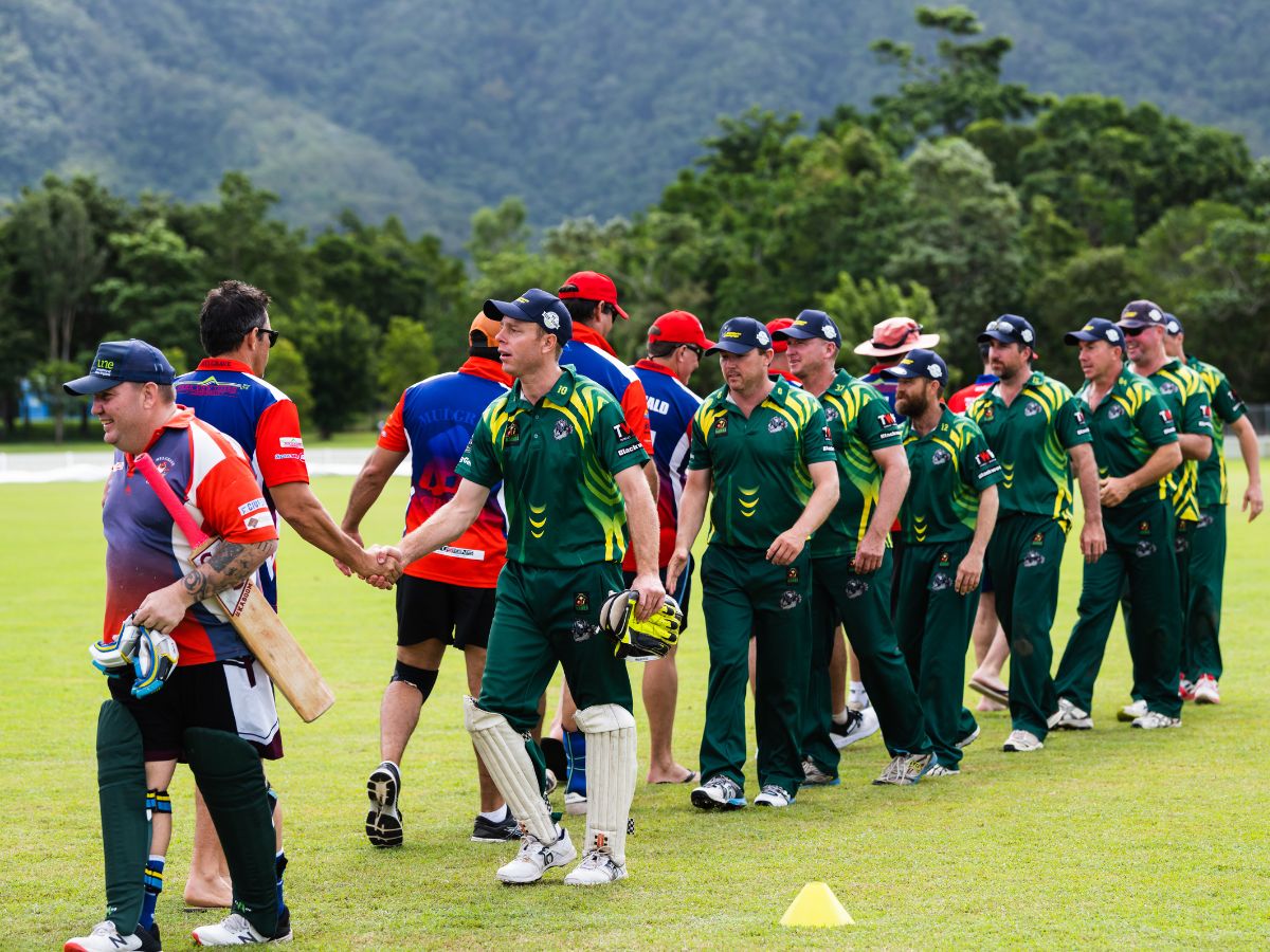 Cricket teams shaking hands